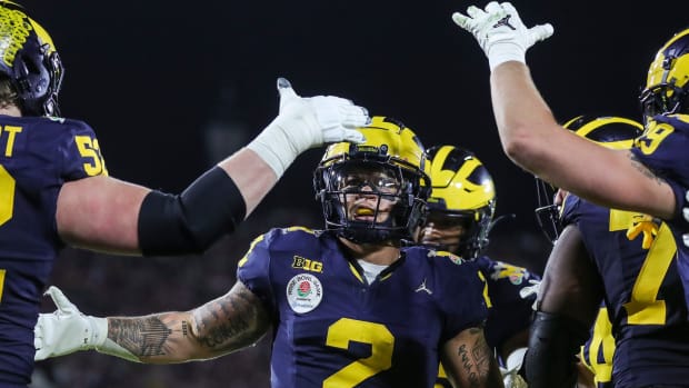 Michigan running back Blake Corum (2) celebrates a touchdown against Alabama in overtime of the Rose Bowl in Pasadena, Calif., on Monday, Jan. 1, 2024.